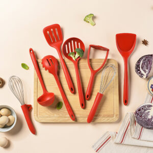 8pcs red kitchen utensils laying on the table