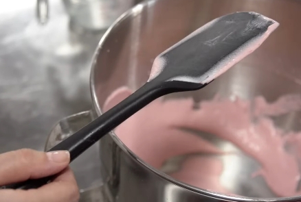 spatula with pink cream