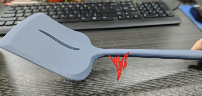 fish turner with red mark